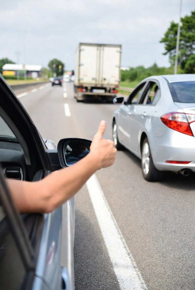 Thumbs Up While Driving